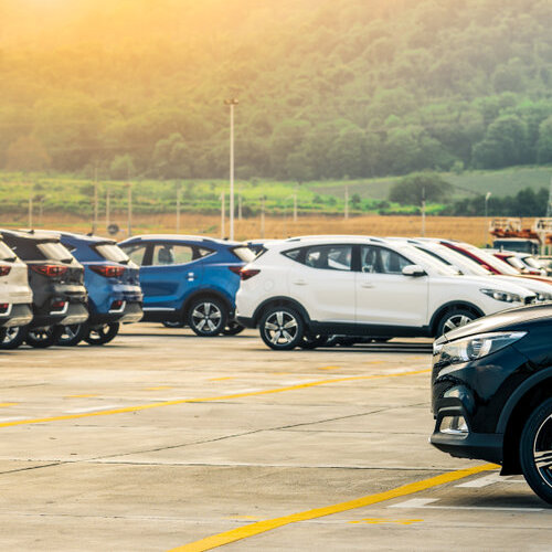 several cars filling a parking lot