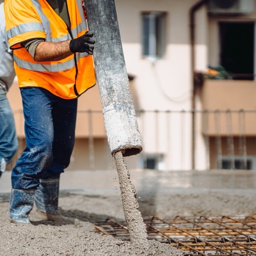 Workers Pouring Concrete