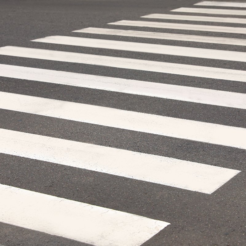 white marks indicating pedestrian crossing