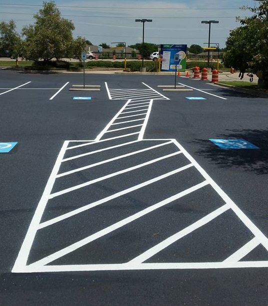 A Picture of an Asphalt Parking Lot.