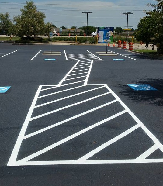 A Picture of an Asphalt Parking Lot.