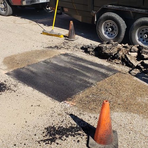 A Picture of Fresh Pothole Repair.