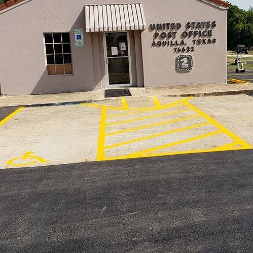 A Picture of a Handicap Logo and Striping.