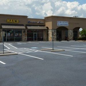 A Picture of a Newly Paved Asphalt Parking Lot.