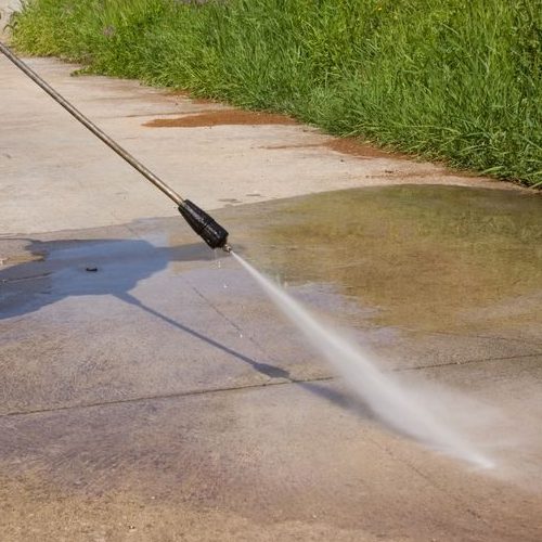 A Picture of Pressure Washing Outdoor Concrete Ground.